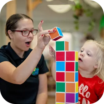 Girl playing with kid